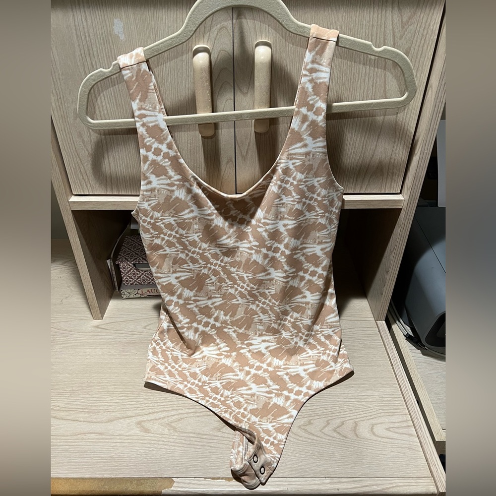 Express Body Contour Cream and White Bodysuit